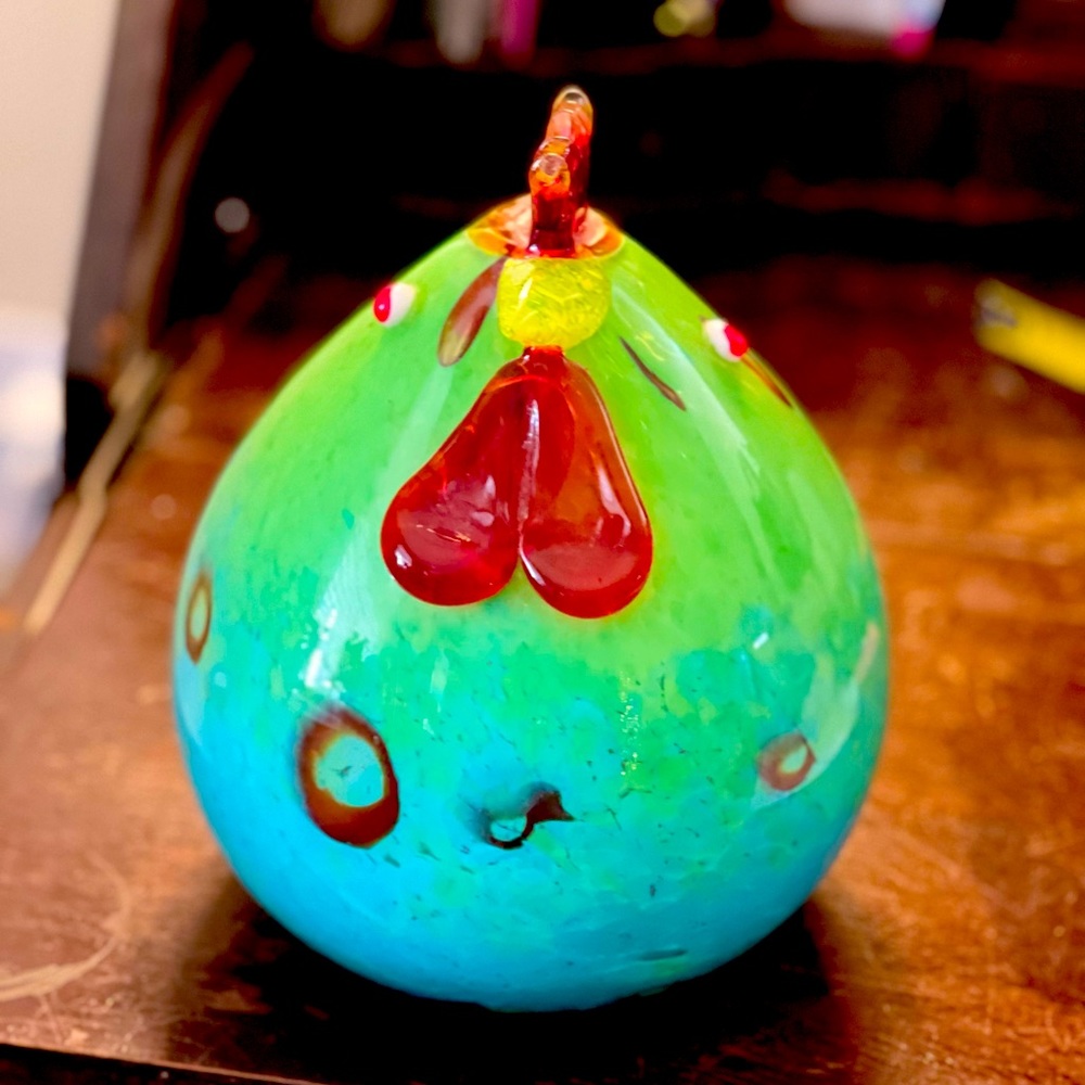 This fun cartoon style hen is in blown Murano glass.